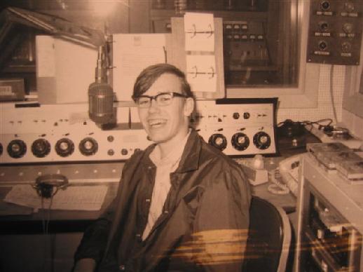 A 1969 shot of me (Rick Burnett a/k/a Rick Mason) when I was visiting the studio. Jimmy Reed let me sit in his chair, but did not let me go on the air. I did not get to talk to the Twin Cities until 1972 when I was hired as a part-time DJ at KTCR-FM, a country station in Minneapolis. I was still in high school when this photo was taken. If you look carefully, you can see the old WDGY transmitter through the studio glass. 